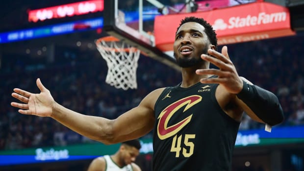 Dec 29, 2023; Cleveland, Ohio, USA; Cleveland Cavaliers guard Donovan Mitchell (45) reacts after a play during the first half against the Milwaukee Bucks at Rocket Mortgage FieldHouse.